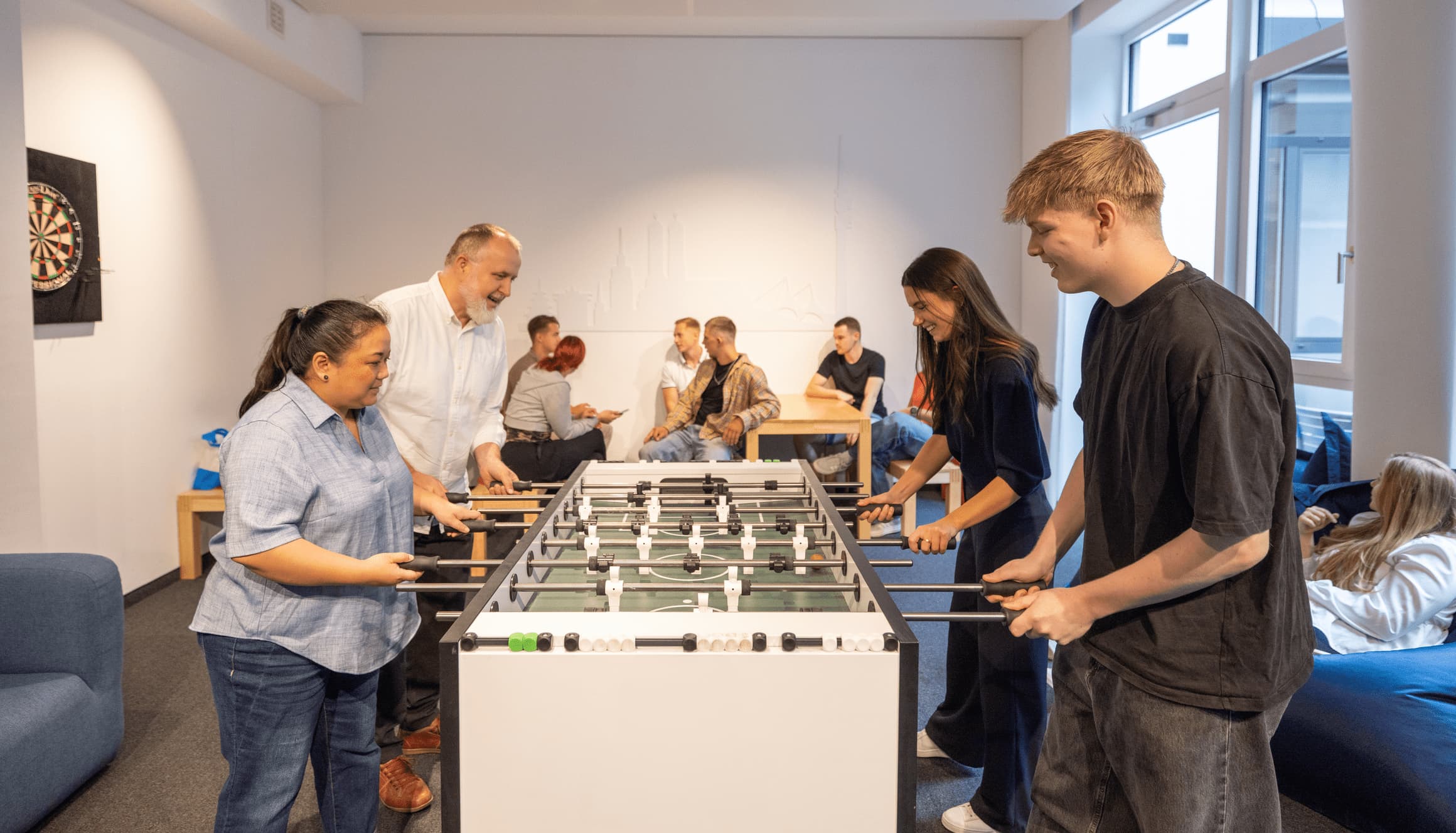 Kollegen bei M-net am Kicker