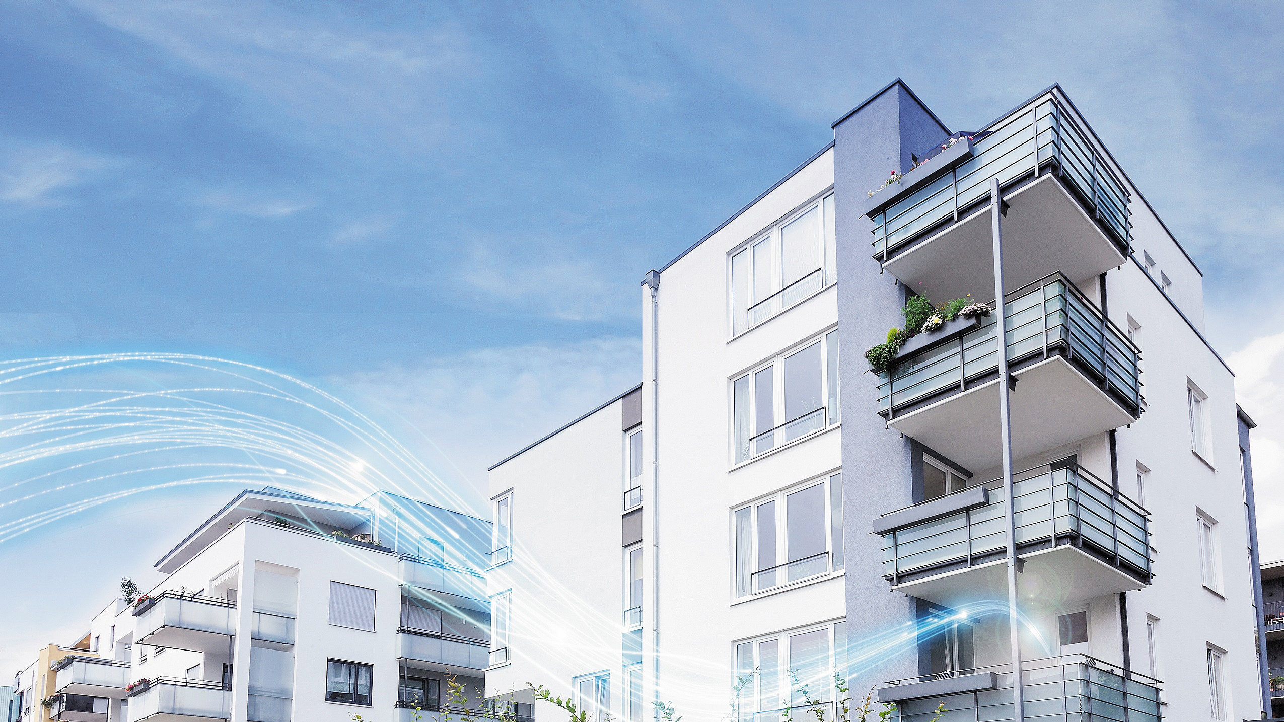 Mehrfamilienhaus mit ein angedeuteten Glasfaser Stream